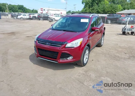 2014 Ford Escape Titanium z USA, uszkodzony, nr VIN 1FMCU0J95EUA74427